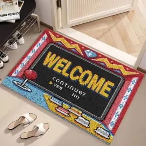 Fußmatte im Retro-Arcade-Design mit Schriftzug Welcome in Rot, Gelb und Blau neben weißen Pantoffeln